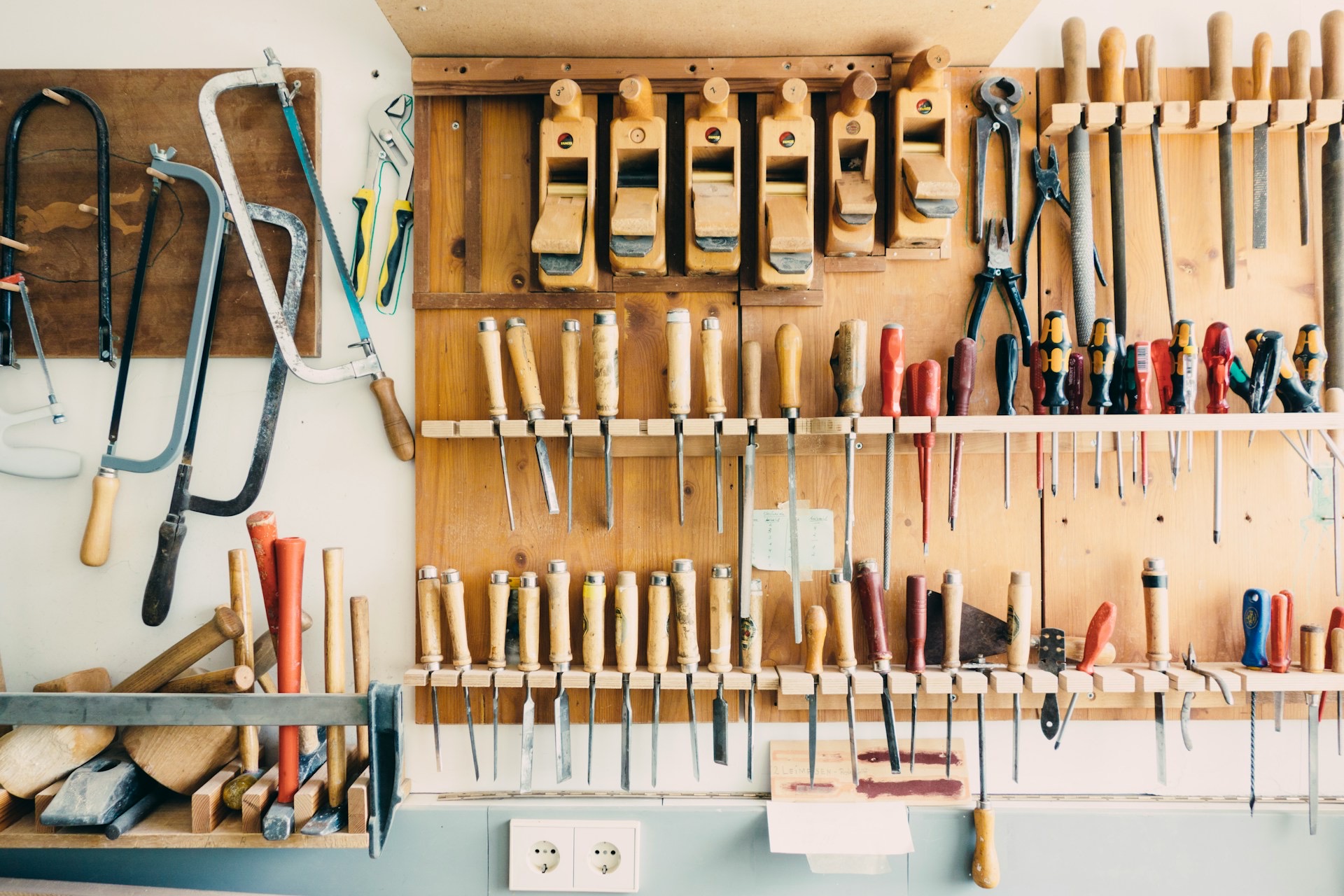 Handheld tools hung in order on a rack